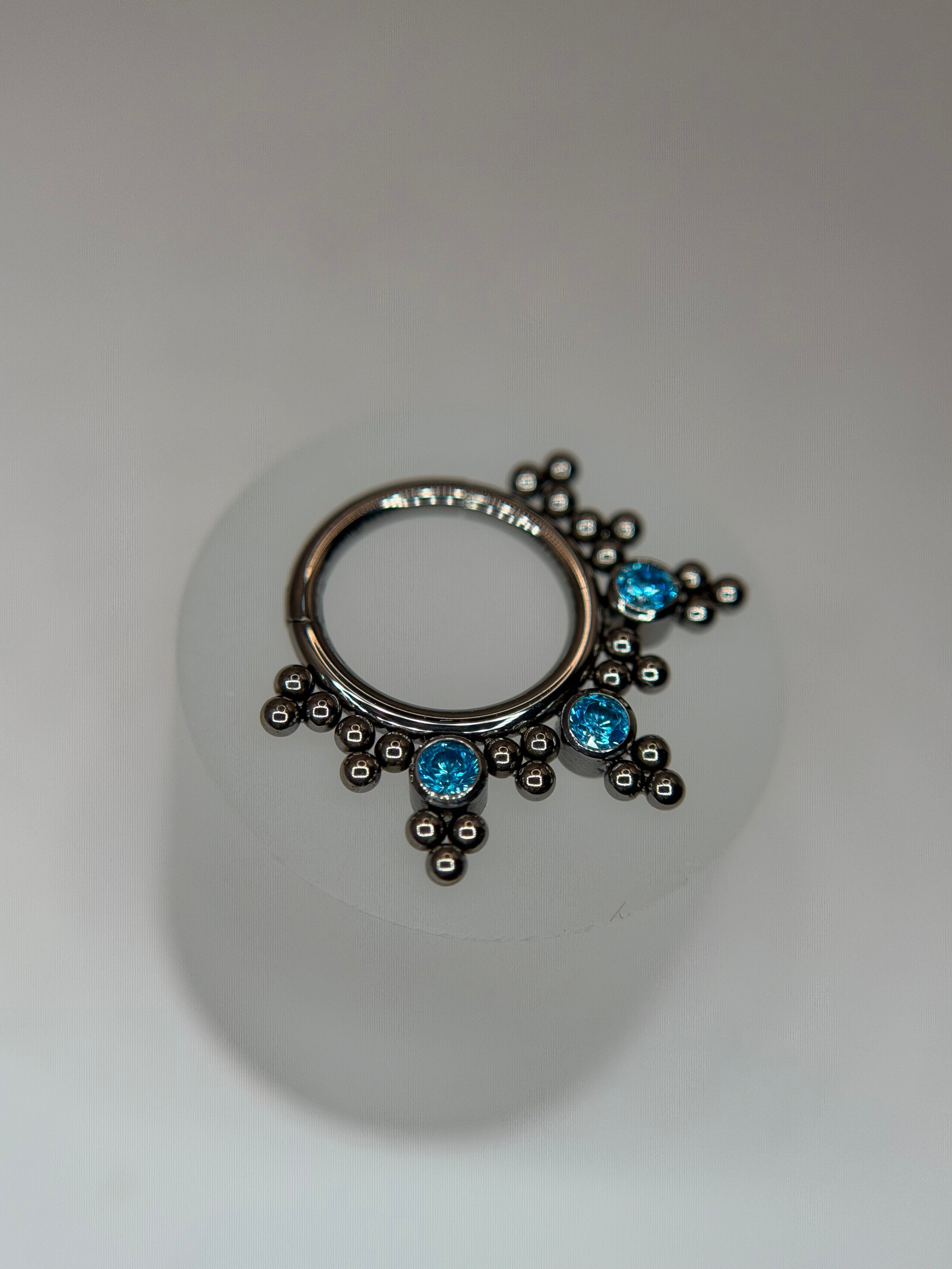 Argola clicker segmento indiano azul